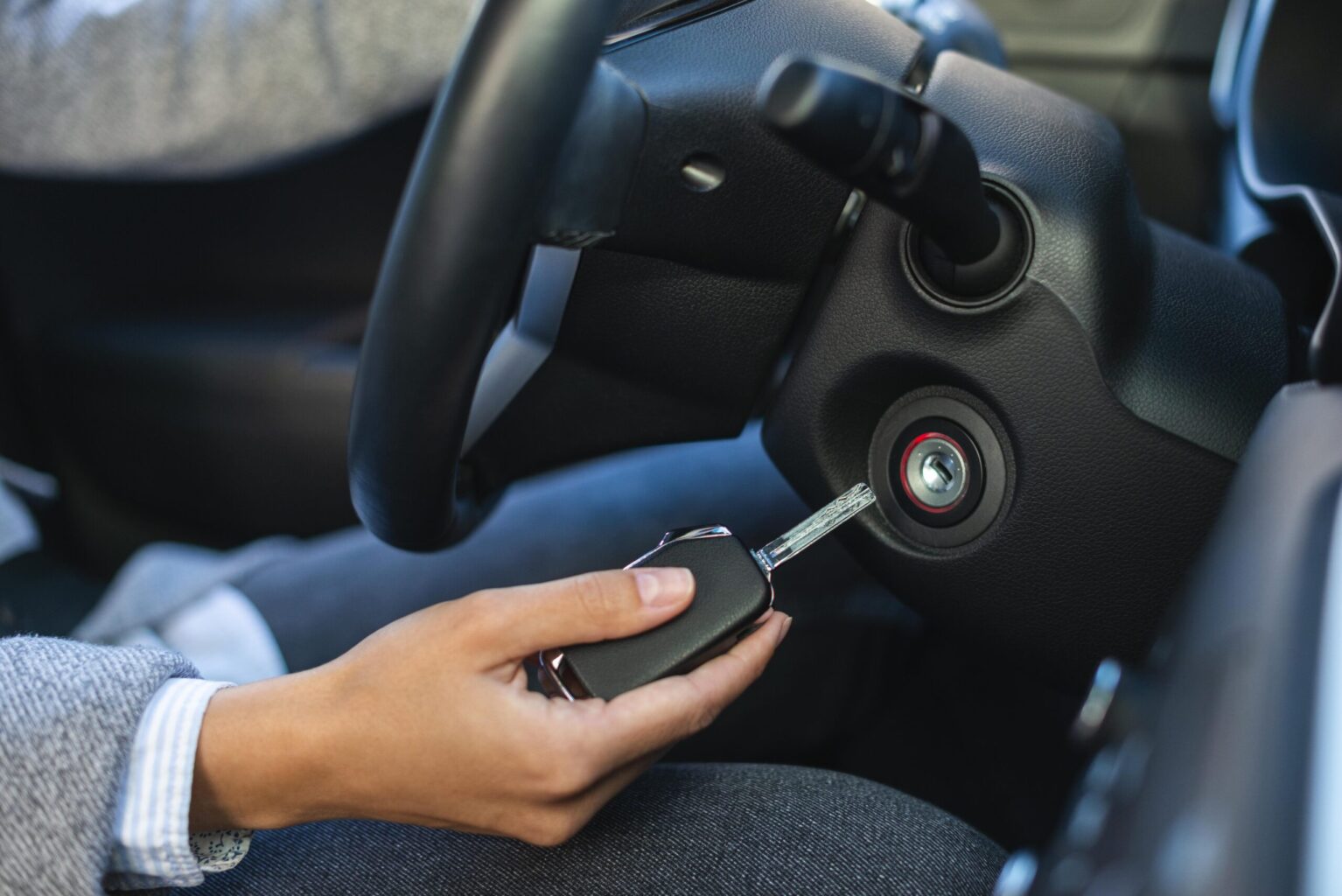 side-view-businesswoman-using-keys-turn-car
